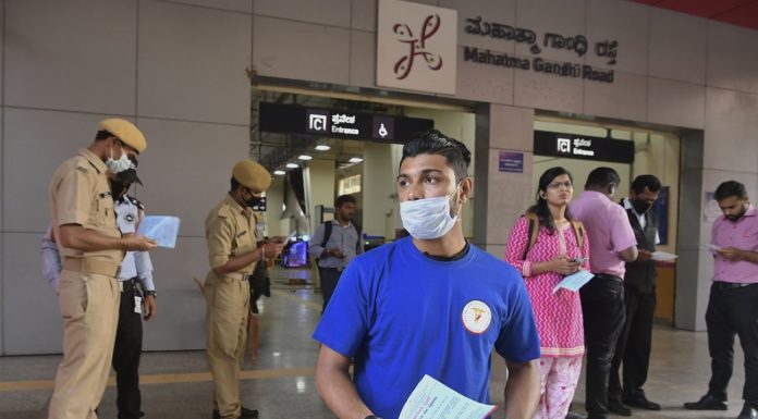 India temporarily suspends almost all visas to contain Covid-19
