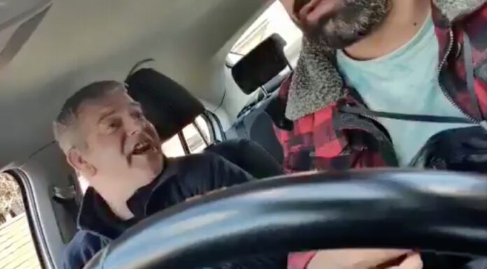 Viral video shows passenger racially abusing taxi driver