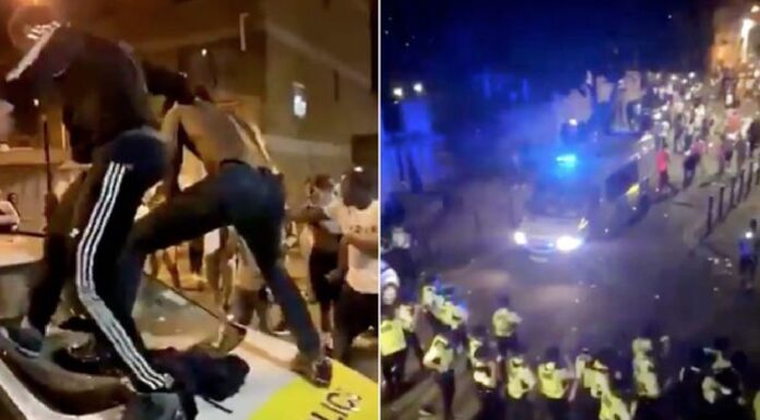 BRIXTON CLASH: Over 20 officers injured and police cars smashed
