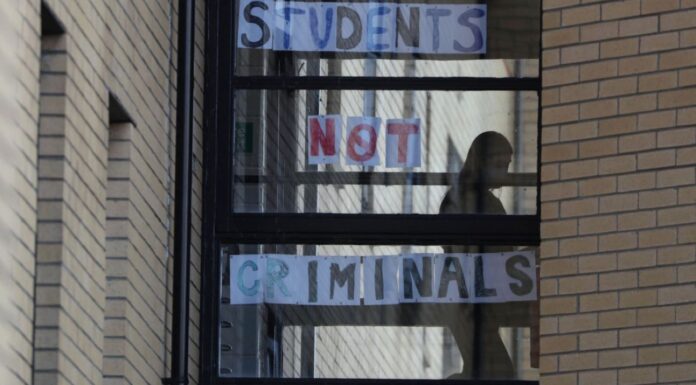 Uni students locked in with security guards and dogs on patrol