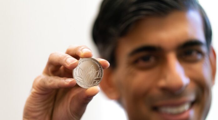 Commemorative coin marking Mahatma Gandhi’s life unveiled by Chancellor